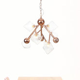 Vintage Ribbed Glass Chandelier: Clear/Amber Prism, 9 Lights - Perfect Dining Room Pendant Light Fixture - This product is a 9-light chandelier made of ribbed glass with a vintage clear/amber prism design. It is 31.5" long, 15" wide, and 14" high. The canop